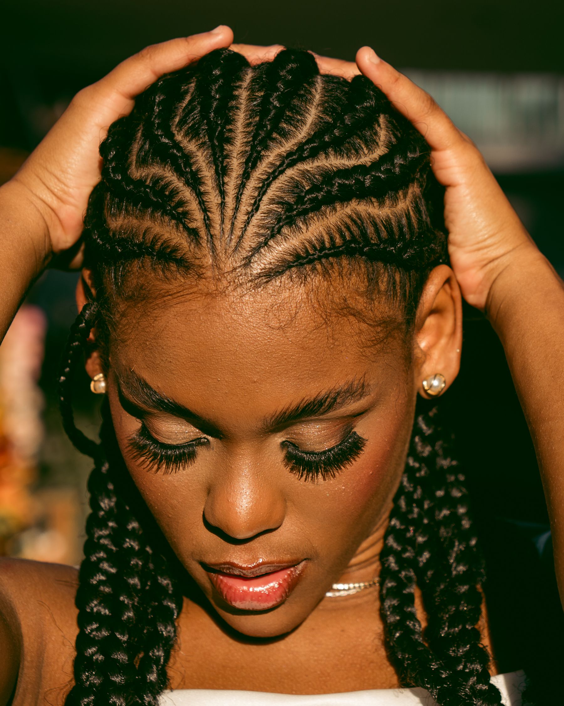 Woman with neat cornrow braids